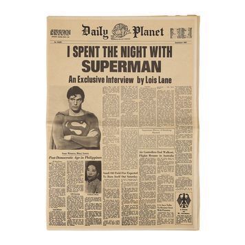 Lot # 1426 : SUPERMAN (1978) - "I Spent the Night with Superman" Daily Planet Newspaper