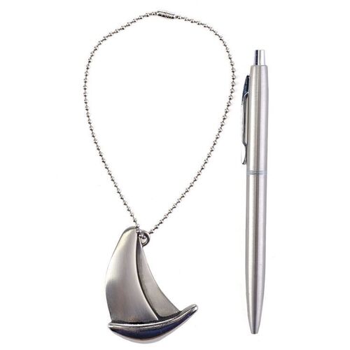 Lot # 290: Renee Picard (Penelope Mitchell) Sailboat Charm and Astronaut Pen