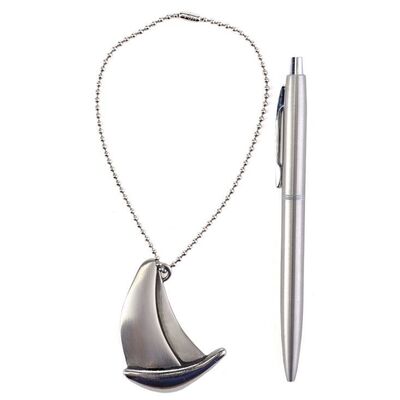 Lot # 290: Renee Picard (Penelope Mitchell) Sailboat Charm and Astronaut Pen
