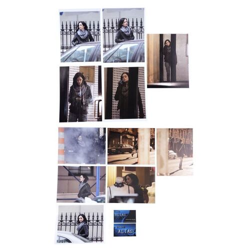 Lot #81: MARVEL'S JESSICA JONES (T.V. SERIES, 2015 - 2019) - Eleven Malcolm Ducasse Photos of Jessica Jones with Two Club Alias Business Cards