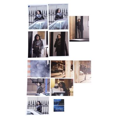 Lot #81: MARVEL'S JESSICA JONES (T.V. SERIES, 2015 - 2019) - Eleven Malcolm Ducasse Photos of Jessica Jones with Two Club Alias Business Cards
