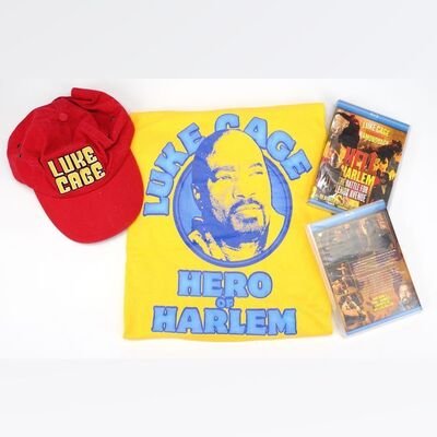 Lot #129: MARVEL'S LUKE CAGE (T.V. SERIES, 2016 - 2018) - D.W. Griffith's Luke Cage Shirt and Hat with Two Blu-Ray Cases