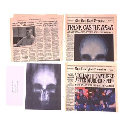 Lot #254: MARVEL - VARIOUS PRODUCTIONS (T.V. SERIES, 2015 - 2019) - Pair of New York Examiner Newspapers with Skull X-Ray Print and Envelope
