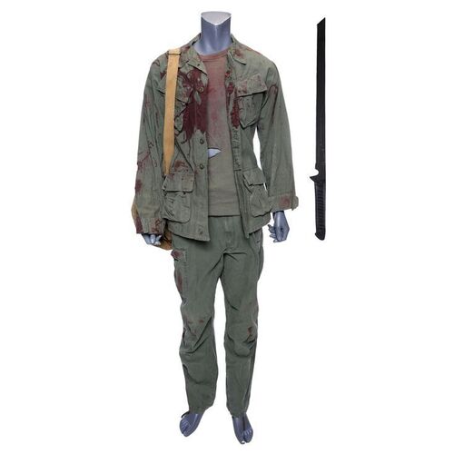 Lot #272: MARVEL'S DAREDEVIL (T.V. SERIES, 2015 - 2018) - Stick's Battle-Damaged Costume, Backpack, and Stunt Blade