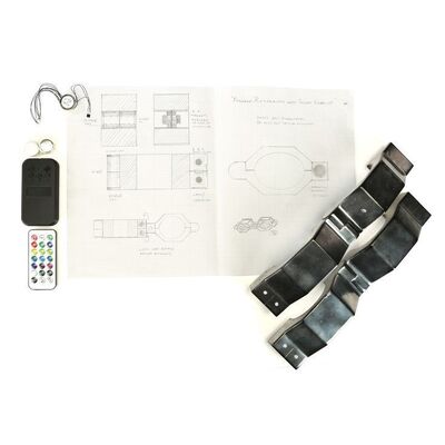 Lot #282: MARVEL'S JESSICA JONES (T.V. SERIES, 2015 - 2019) - Pair of Restraint Cuffs with Remote Controls and Concept Art
