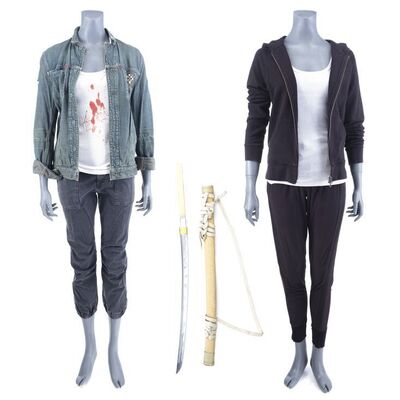 Lot #423: MARVEL'S IRON FIST (T.V. SERIES, 2017 - 2018) - Colleen Wing's Bloodied Betrayal Costume and Skills Costume with Wooden Blade and Sheath
