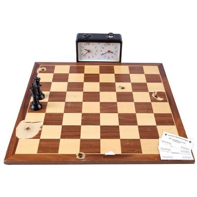 Lot #437: MARVEL'S LUKE CAGE (T.V. SERIES, 2016 - 2018) - Pop's Bullet-Riddled Chessboard with Clock, Chess Pieces and James Lucas Business Cards