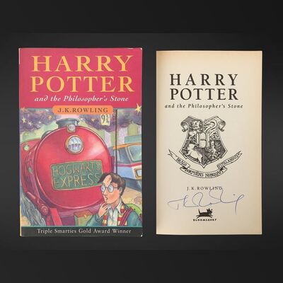 Lot #152 - HARRY POTTER AND THE PHILOSOPHER'S STONE (2001) - J.K. Rowling Autographed British Paperback Edition, 1997