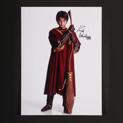 Lot #154 - HARRY POTTER AND THE CHAMBER OF SECRETS (2002) - Daniel Radcliffe Autographed Publicity Still