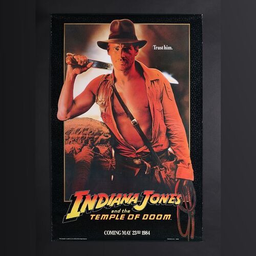 Lot #167 - INDIANA JONES AND THE TEMPLE OF DOOM (1984) - US One-Sheet - Advance "Trust Him" Style, 1984