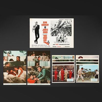 Lot #201 - JAMES BOND: YOU ONLY LIVE TWICE (1967) - Complete Sets of Eight First Release Front of House Cards and Re-Release Cards with Exhibitors' Campaign Book, 1967 and 1970s