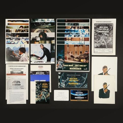 Lot #228 - JAMES BOND: MOONRAKER (1979) - Complete Set of Eight US Lobby Cards, Eight US Mini Lobby Cards, Eight British Front of House Cards and Various Press Items, 1979