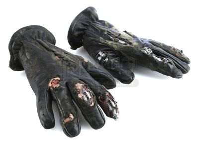 TERMINATOR 2: JUDGEMENT DAY (1991) - The Terminator's (Arnold Schwarzenegger) Battle-Damaged Leather Gloves with Endoskeleton Fingers
