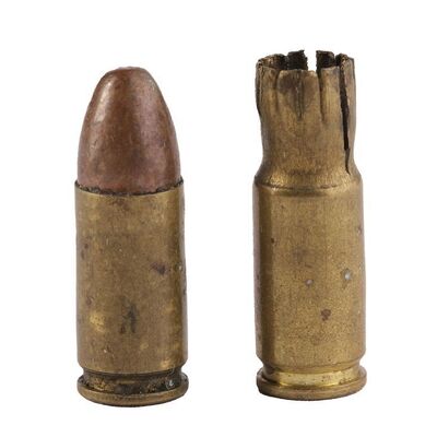 Lot # 218: DIE HARD (1988) - Pair of John McClane's (Bruce Willis) Beretta 92F Bullets