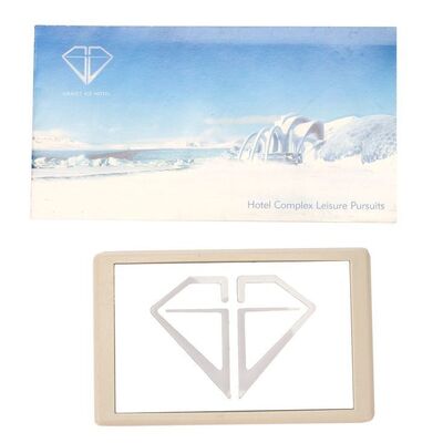 Lot # 421: DIE ANOTHER DAY (2002) - Gustav Graves' (Toby Stephens) Ice Palace Key Panel and Brochure