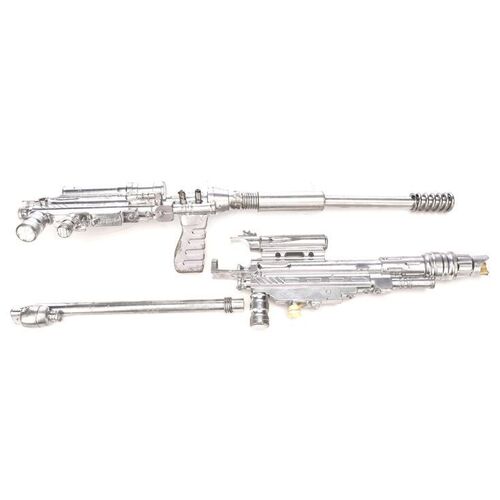 Lot # 523: MEN IN BLACK II (2002) - Pair of Stunt Guns with Extra Parts
