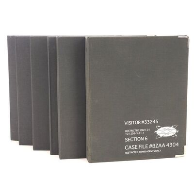 Lot # 526: MEN IN BLACK II (2002) - Set of Six Small "Visitor" Binders