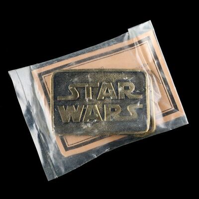 Lot # 787: STAR WARS: A NEW HOPE (1977) - Howard Kazanjian Collection: Belt Buckle Crew Gift