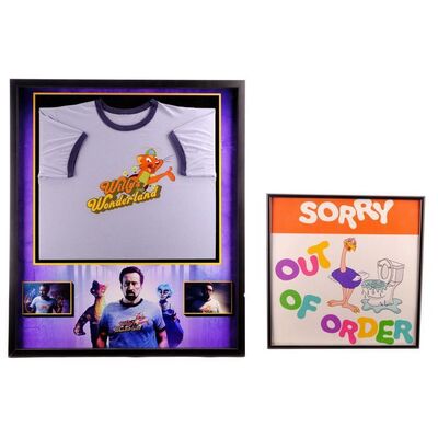 Lot # 1022: WILLY'S WONDERLAND (2021) - The Janitor's (Nicolas Cage) Framed Shirt with Willy's Wonderland Bathroom Sign