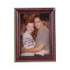 Lot #9: Framed Inscribed Victoria Newman (as played by Heather Tom) and Cole Howard (as played by Eddie Peck) Photo
