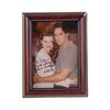 Lot #9: Framed Inscribed Victoria Newman (as played by Heather Tom) and Cole Howard (as played by Eddie Peck) Photo