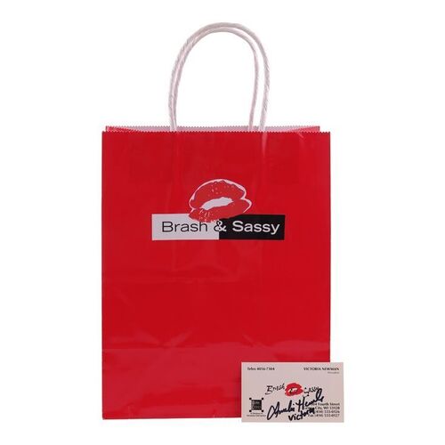 Lot #16: Victoria Newman's (as played by Amelia Heinle) Signed Brash & Sassy Business Card and Gift Bag