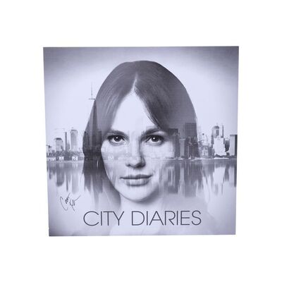 Lot #54: Tessa Porter's (as played by Cait Fairbanks) Signed "City Diaries" Album Cover
