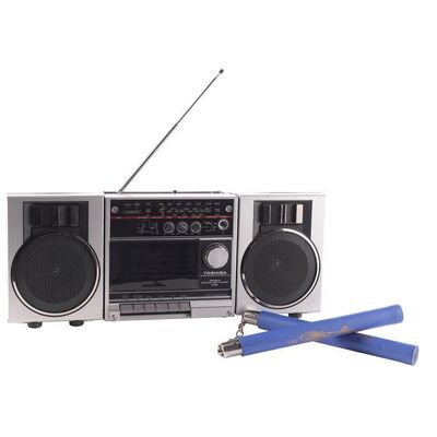 Lot # 43: Beverly Goldberg's (as played by Wendi McLendon-Covey) Season 10 Boombox and Barry Goldberg's (as played by Troy Gentile) Foam Nunchucks Toy