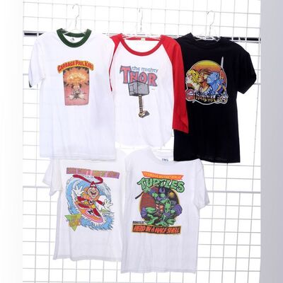 Lot # 81: Adam Goldberg's (as played by Sean Giambrone) 80s Cartoon Shirts