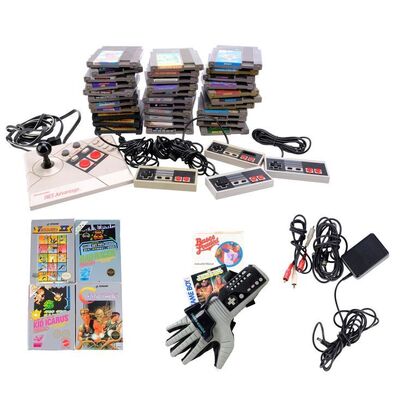 Lot # 90: Nintendo Accessories with Games and Power Glove