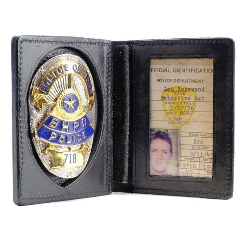 Lot #47 - Det. Billy Rosewood's (Judge Reinhold) BHPD ID and Badge ### BEVERLY HILLS COP (1984)