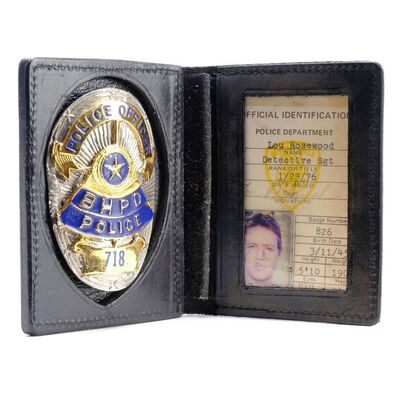 Lot #47 - Det. Billy Rosewood's (Judge Reinhold) BHPD ID and Badge ### BEVERLY HILLS COP (1984)