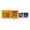 Lot #101 - Christine's License Plate, Key, and Two Production Photos ### CHRISTINE (1983)