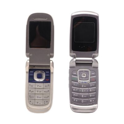 Lot #654 - Walter White's (Bryan Cranston) and Syklar White's (Anna Gunn) Burner Phones ### BREAKING BAD (TV SERIES, 2008-2013)