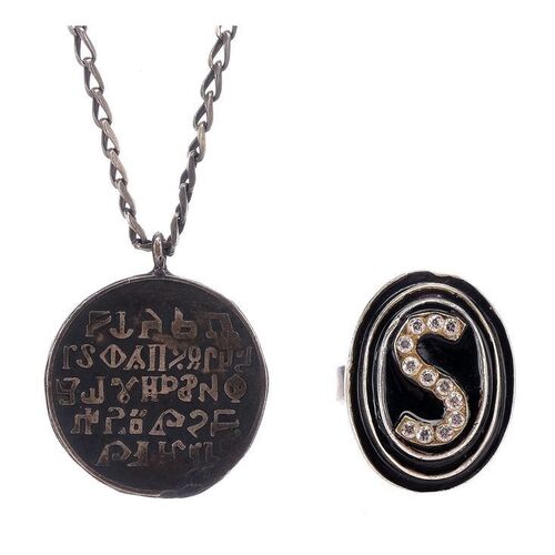 Lot #1181 - Yogurt's (Mel Brooks) Schwartz Ring and Lone Starr's (Bill Pullman) Medallion Necklace ### SPACEBALLS (1987)
