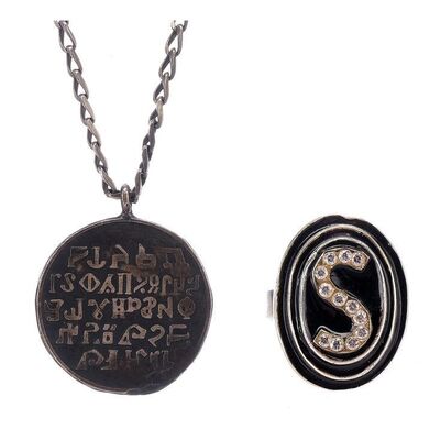 Lot #1181 - Yogurt's (Mel Brooks) Schwartz Ring and Lone Starr's (Bill Pullman) Medallion Necklace ### SPACEBALLS (1987)
