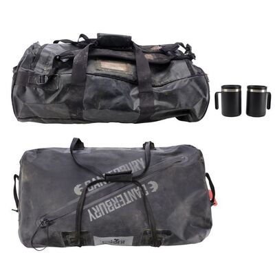 Lot # 22: James Holden's (Steven Strait) Canterbury Duffle with Tachi Bag and Pair of Coffee Mugs
