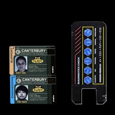 Lot # 27: Pair of Canterbury IDs and Comm Device with Decals