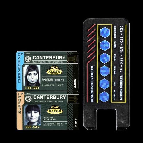 Lot # 39: Pair of Canterbury IDs and Comm Device with Decals