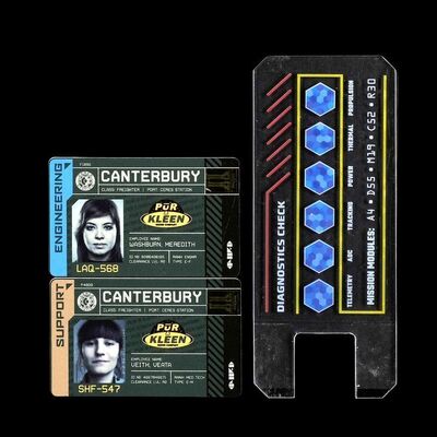 Lot # 39: Pair of Canterbury IDs and Comm Device with Decals
