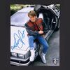 Lot #34 - BACK TO THE FUTURE PART II (1989) - Michael J. Fox Autographed Full-colour Still