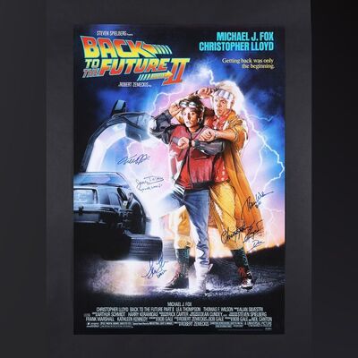Lot #35 - BACK TO THE FUTURE PART II (1989) - Michael J. Fox, Christopher Lloyd, Thomas F. Wilson, Lea Thompson and James Tolkan Autographed Commercial Poster