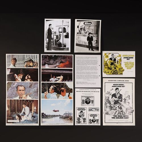 Lot #260 - JAMES BOND: THE MAN WITH THE GOLDEN GUN (1974) - Eight British Front of House Cards and Collection of Press Material, 1974