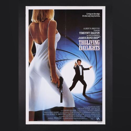 Lot #282 - JAMES BOND: THE LIVING DAYLIGHTS (1987) - Two US One-Sheets, UK "Piracy" Double Crown and Set of UK Oversized Stills, 1987