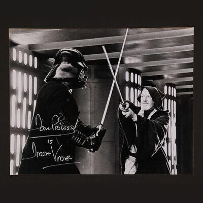 Lot #476 - STAR WARS: A NEW HOPE (1977) AND STAR WARS: THE EMPIRE STRIKES BACK (1980) - Two Black-and-white Stills Autographed by Dave Prowse, Jeremy Bulloch and Alan Harris
