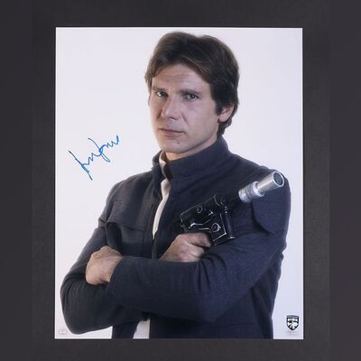 Lot #493 - STAR WARS: THE EMPIRE STRIKES BACK (1980) - Harrison Ford Autographed Full-Colour Photograph
