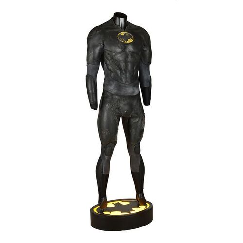 Lot #39: BATMAN (1989) - Batman's (Michael Keaton) Battle-damaged Batsuit & Stunt Chest Emblem