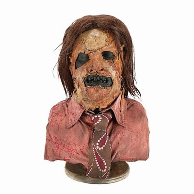 Lot #247: LEATHERFACE: THE TEXAS CHAINSAW MASSACRE III (1990) - Leatherface (R.A. Mihailoff) Mask Display