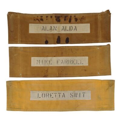 Lot #248: M*A*S*H (1972-1983) - Alan Alda's, Mike Farrell's, and Loretta Swit's Chairbacks