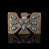 Lot #491: JOHN LENNON - John Lennon-owned Photo-matched Belt Buckle